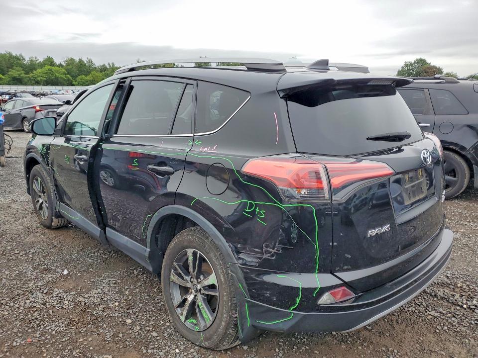 Photo 2 from auction – 2018 TOYOTA RAV4 with VIN 2T3RFREV5JW713651