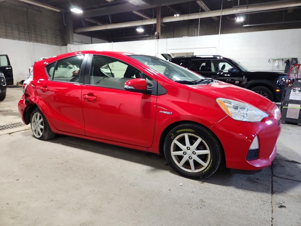 Photo 4 from auction – 2012 TOYOTA PRIUS C with VIN JTDKDTB34C1515524