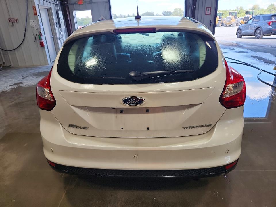 Photo 6 from auction – 2014 FORD FOCUS with VIN 1FADP3N21EL395620