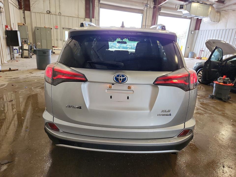 Photo 6 from auction – 2016 TOYOTA RAV4 HV with VIN JTMRJREV4GD039545