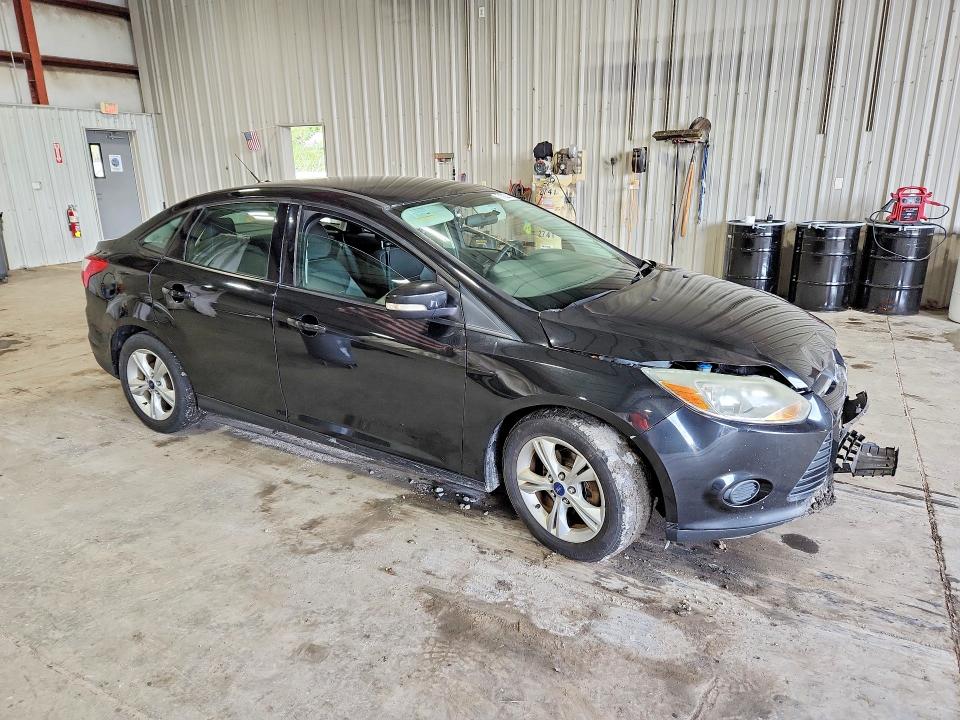 Снимка 4 от търг – 2014 FORD FOCUS с VIN 1FADP3F25EL424552