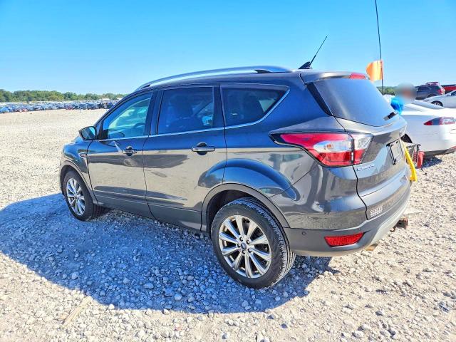 Снимка 2 от търг – 2018 FORD ESCAPE с VIN 1FMCU9J90JUC33644