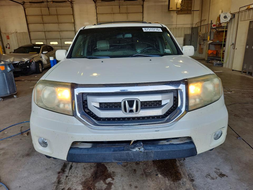 Снимка 5 от търг – 2011 HONDA PILOT с VIN 5FNYF4H92BB049121