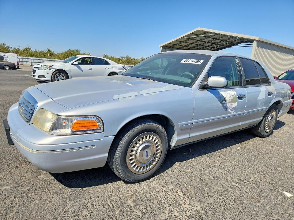 FORD CROWN VICTORIA 2002 with VIN 2FAFP71W22X115890 - Photo from auction