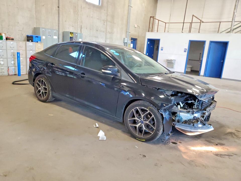 Снимка 4 от търг – 2018 FORD FOCUS с VIN 1FADP3H22JL259762