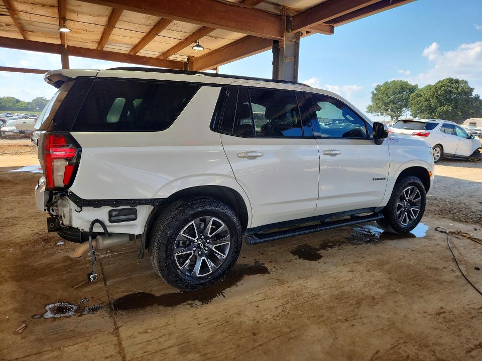 Photo 3 from auction – 2021 CHEVROLET TAHOE with VIN 1GNSKPKD7MR451673