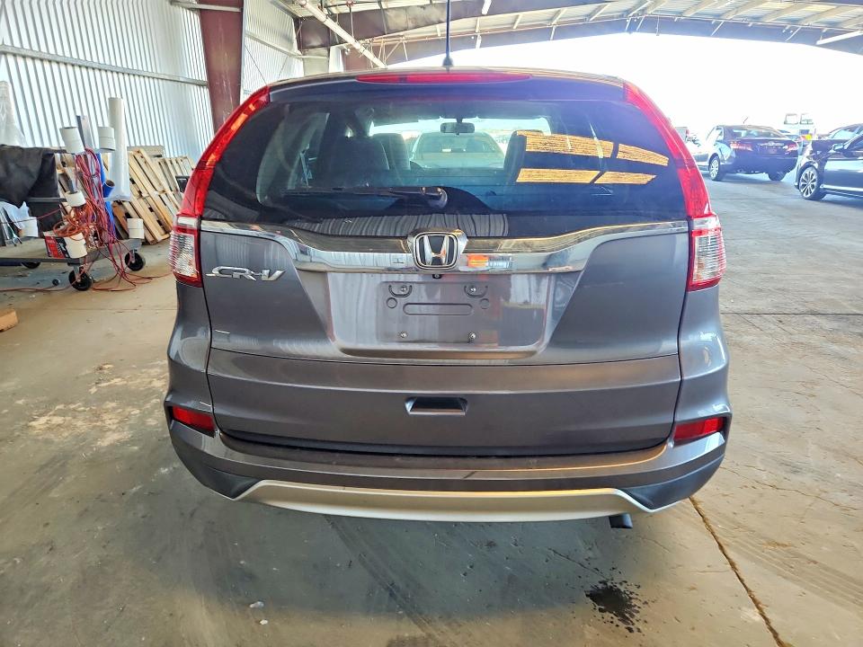 Photo 6 from auction – 2015 HONDA CR-V with VIN 2HKRM3H58FH529558