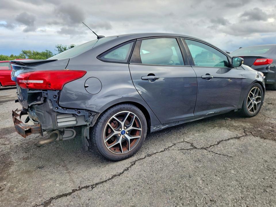 Photo 3 from auction – 2015 FORD FOCUS with VIN 1FADP3F25FL291552