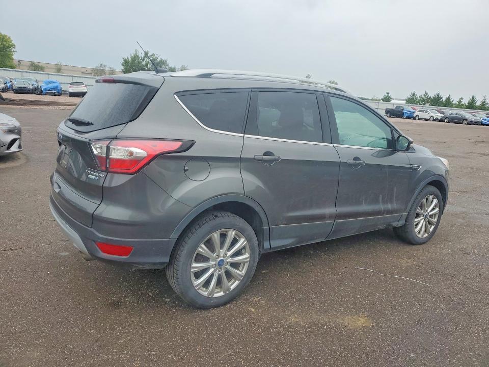 Photo 3 from auction – 2017 FORD ESCAPE with VIN 1FMCU9J94HUC09082