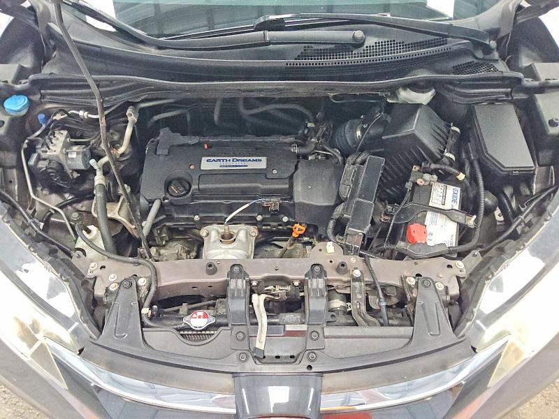 Photo 11 from auction – 2015 HONDA CR-V with VIN 2HKRM4H55FH705181