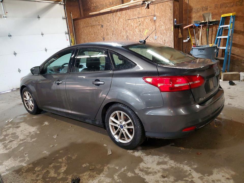 Снимка 2 от търг – 2018 FORD FOCUS с VIN 1FADP3FE1JL301223