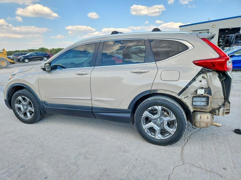 Photo 2 from auction – 2018 HONDA CR-V with VIN 2HKRW2H80JH698240