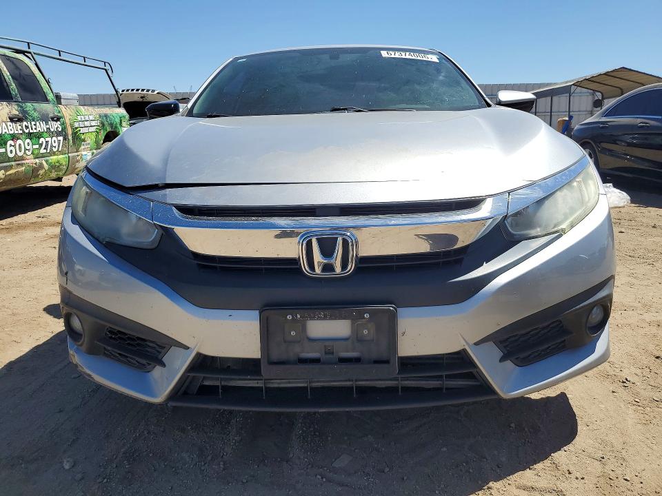 Photo 5 from auction – 2018 HONDA CIVIC with VIN 2HGFC3B30JH354044