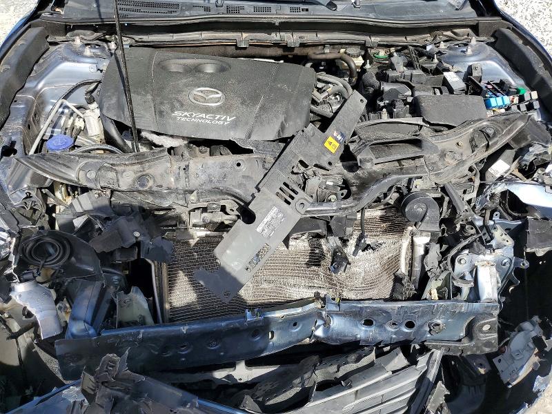 Photo 11 from auction – 2015 MAZDA 3 with VIN 3MZBM1U79FM124572