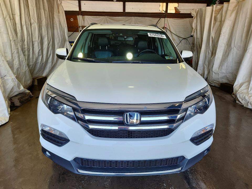 Foto 5 de la subasta – 2016 HONDA PILOT con VIN 5FNYF6H05GB113768