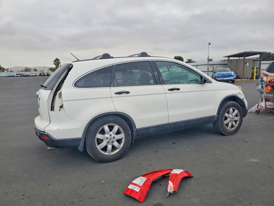 Photo 3 from auction – 2009 HONDA CR-V with VIN 5J6RE38539L032182