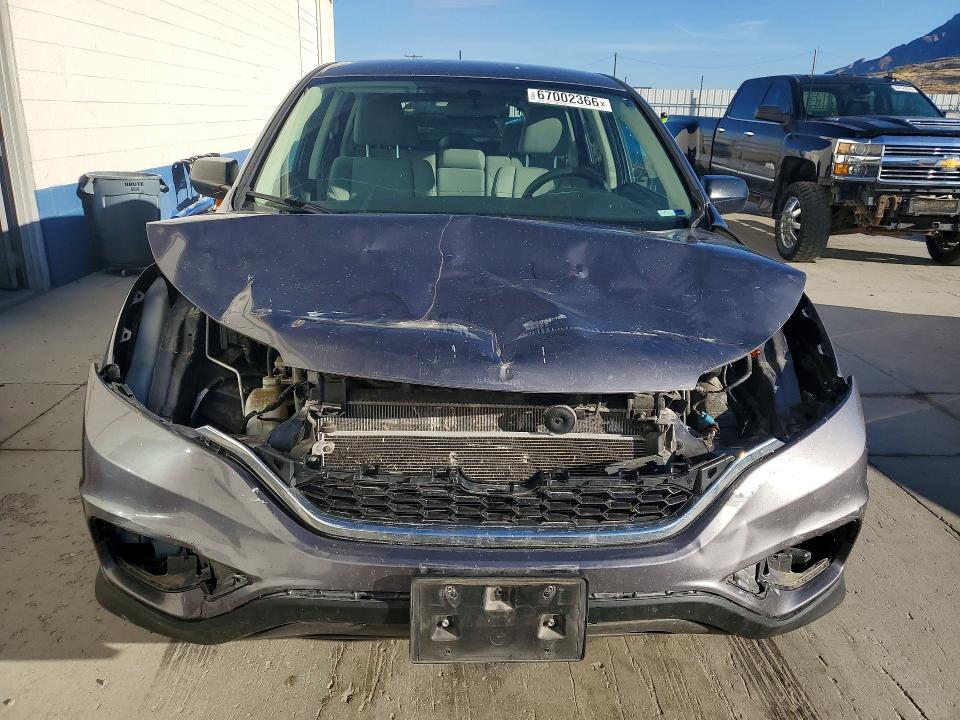 Photo 5 from auction – 2015 HONDA CR-V with VIN 2HKRM4H30FH696355