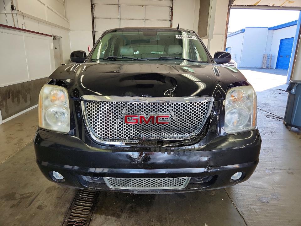 Photo 5 from auction – 2007 GMC YUKON with VIN 1GKFK63867J400453