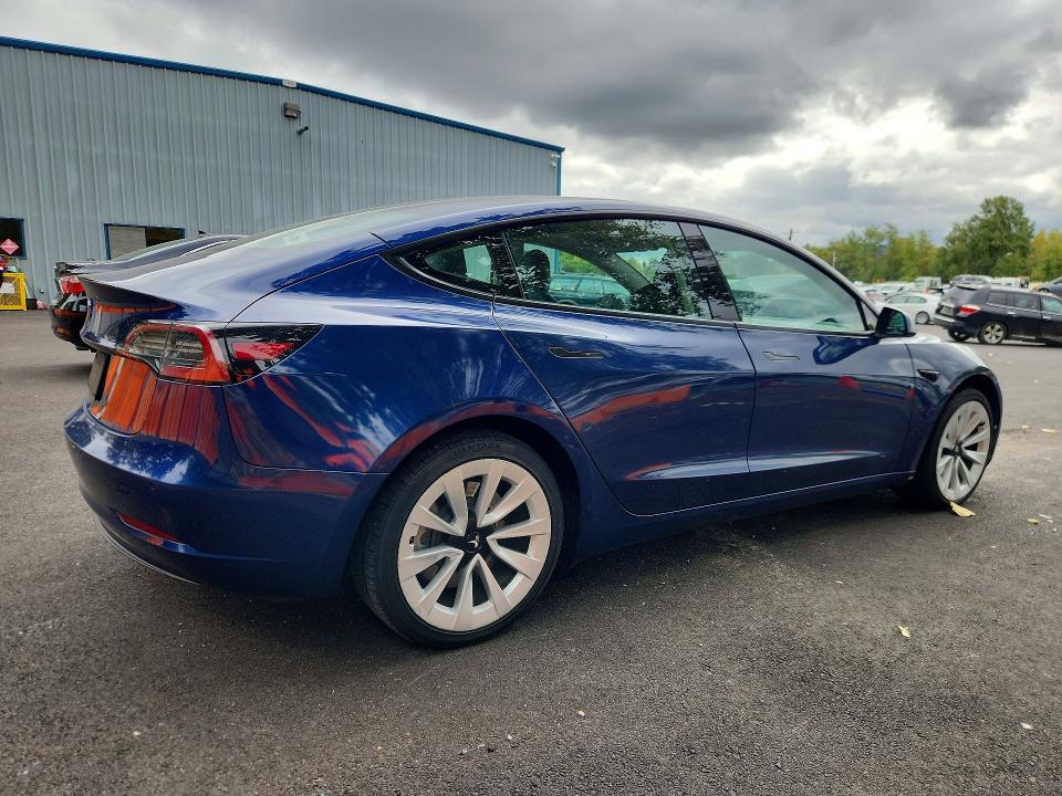 Photo 3 from auction – 2022 TESLA MODEL 3 with VIN 5YJ3E1EA1NF303884