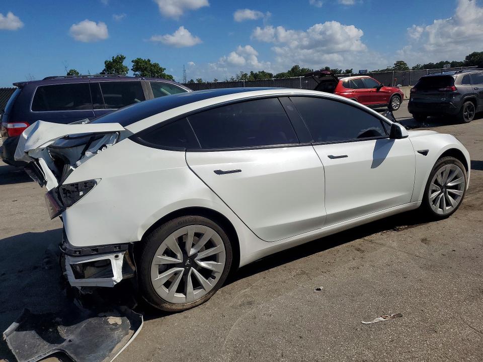 Снимка 3 от търг – 2023 TESLA MODEL 3 с VIN 5YJ3E1EA2PF510058