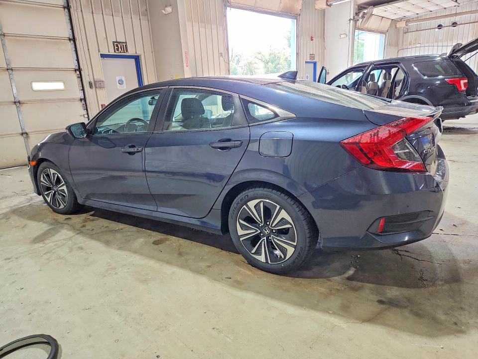 Photo 2 from auction – 2018 HONDA CIVIC with VIN 2HGFC1F35JH640390