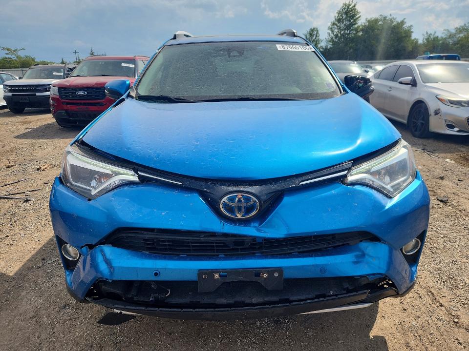 Photo 5 from auction – 2016 TOYOTA RAV4 HV with VIN JTMDJREV5GD024935