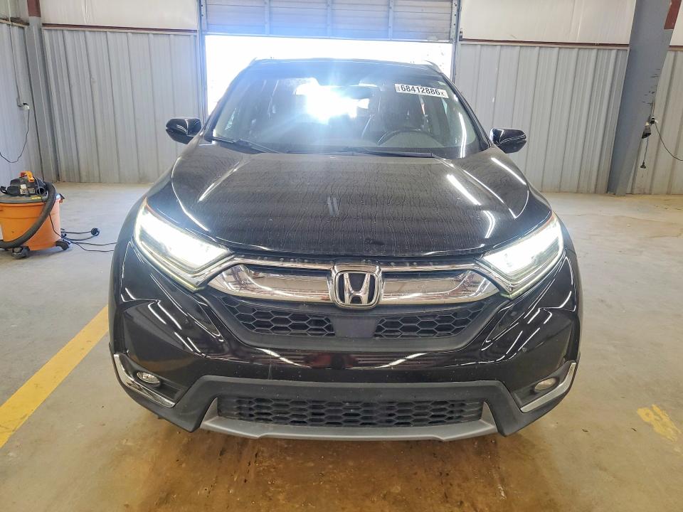 Photo 5 from auction – 2017 HONDA CR-V with VIN 7FARW1H9XHE043938