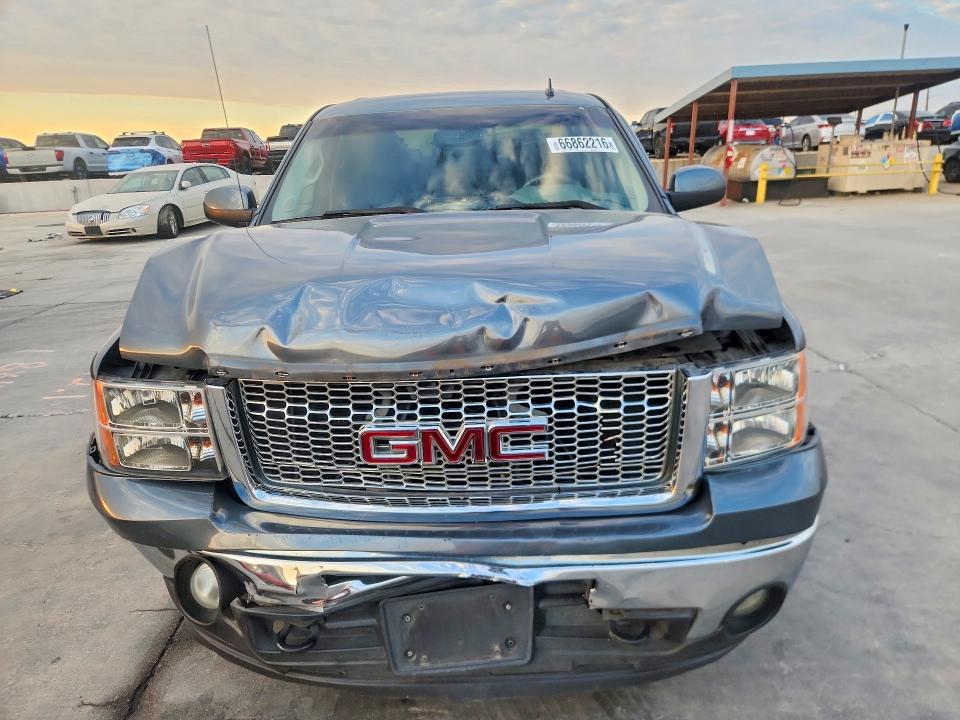 Foto 5 de la subasta – 2009 GMC SIERRA con VIN 3GTEC23J29G105385