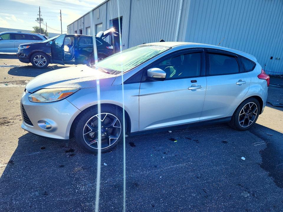 FORD FOCUS 2014 with VIN 1FADP3K23EL221861 - Photo from auction
