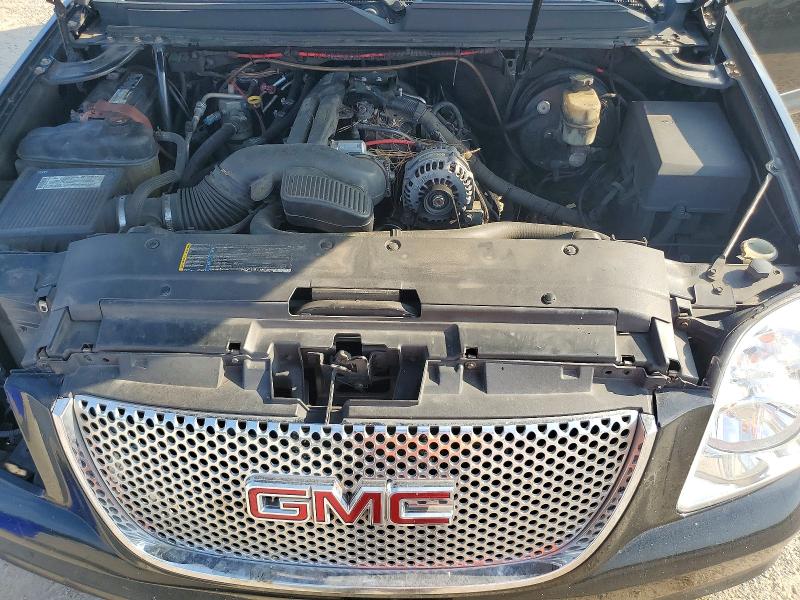 Photo 12 from auction – 2007 GMC YUKON with VIN 1GKFC130X7R423729