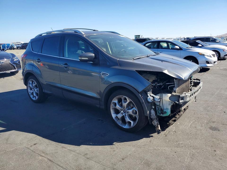 Photo 4 from auction – 2015 FORD ESCAPE with VIN 1FMCU0J94FUA63226
