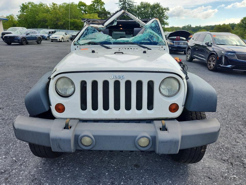 Снимка 5 от търг – 2009 JEEP WRANGLER UNLIMITED с VIN 1J4GA39149L766750