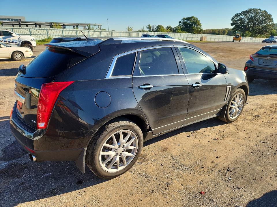 Photo 3 from auction – 2014 CADILLAC SRX with VIN 3GYFNGE3XES596865