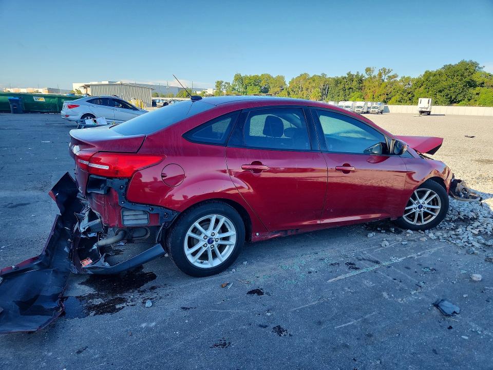 Снимка 3 от търг – 2016 FORD FOCUS с VIN 1FADP3F20GL292674