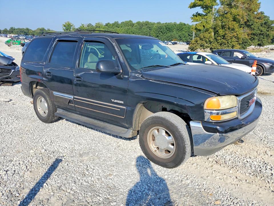 Photo 4 from auction – 2003 GMC YUKON with VIN 1GKEC13Z33J276043