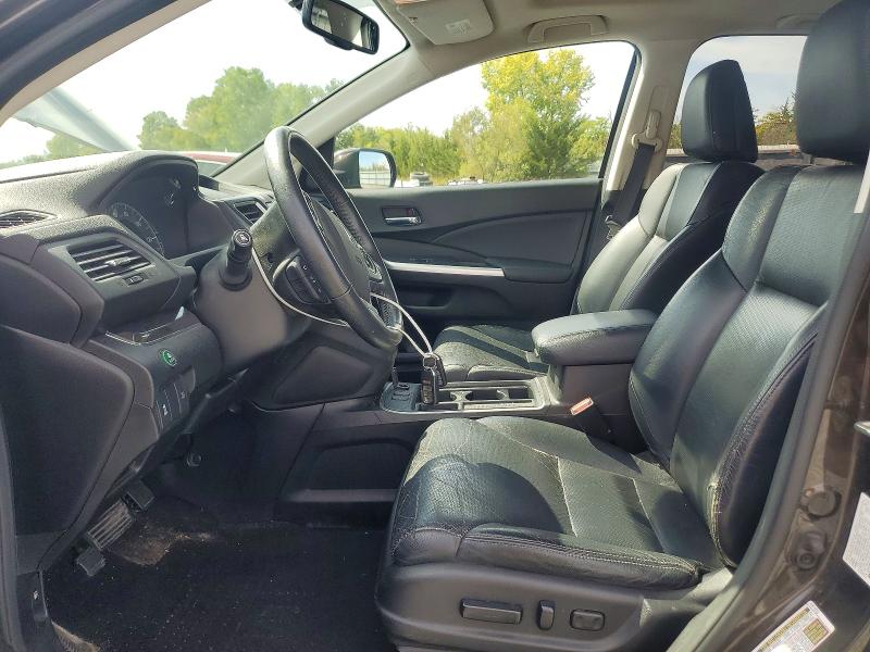 Photo 7 from auction – 2015 HONDA CR-V with VIN 2HKRM4H71FH601272