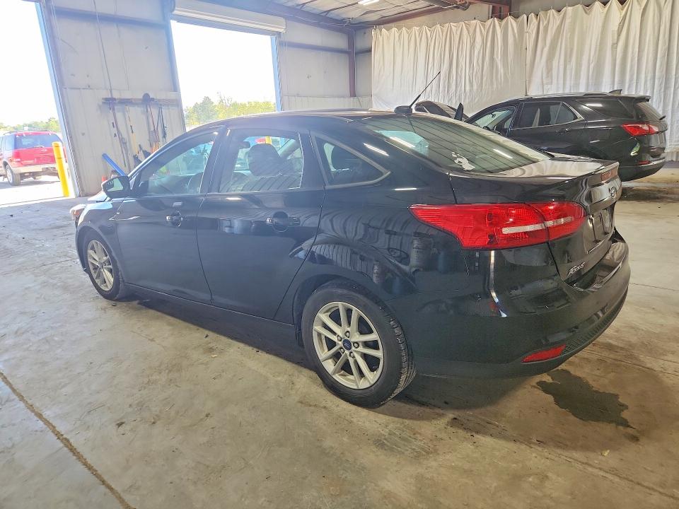 Снимка 2 от търг – 2016 FORD FOCUS с VIN 1FADP3F25GL218957