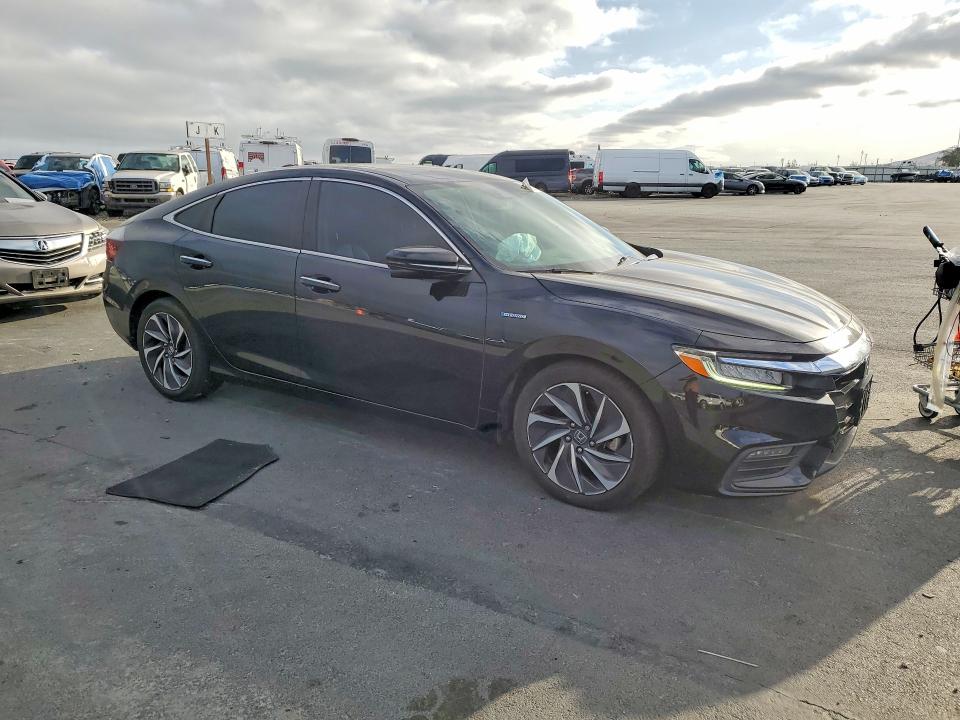 Photo 4 from auction – 2019 HONDA INSIGHT with VIN 19XZE4F93KE013891