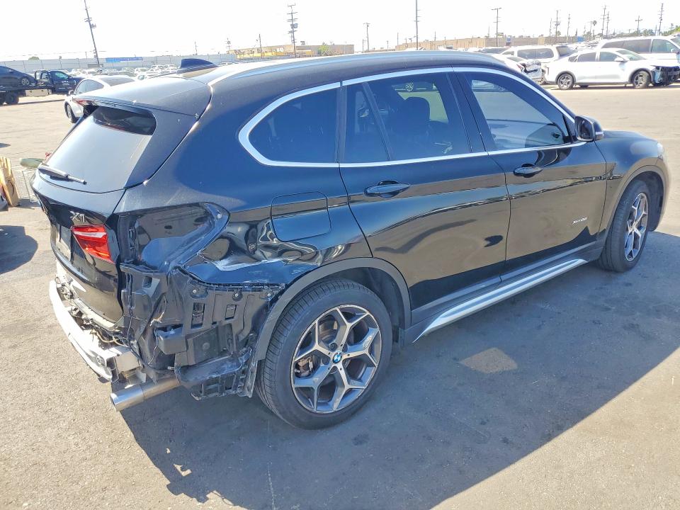 Снимка 3 от търг – 2018 BMW X1 с VIN WBXHT3Z38J4A66773