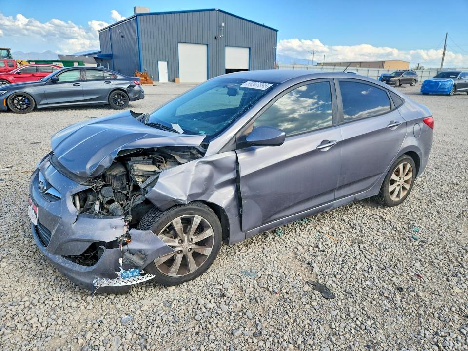 HYUNDAI ACCENT 2014 with VIN KMHCU4AE0EU740985 - Photo from auction
