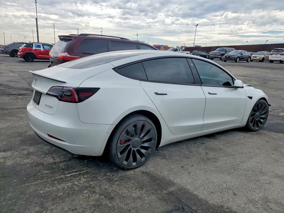Photo 3 from auction – 2022 TESLA MODEL 3 with VIN 5YJ3E1EC9NF239434