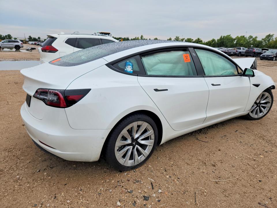 Снимка 3 от търг – 2022 TESLA MODEL 3 с VIN 5YJ3E1EB0NF144199
