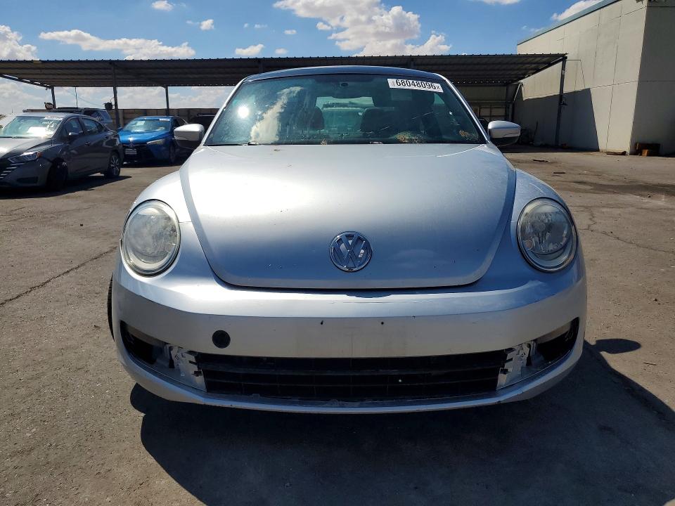 Photo 5 from auction – 2013 VOLKSWAGEN BEETLE with VIN 3VWJP7AT7DM676673