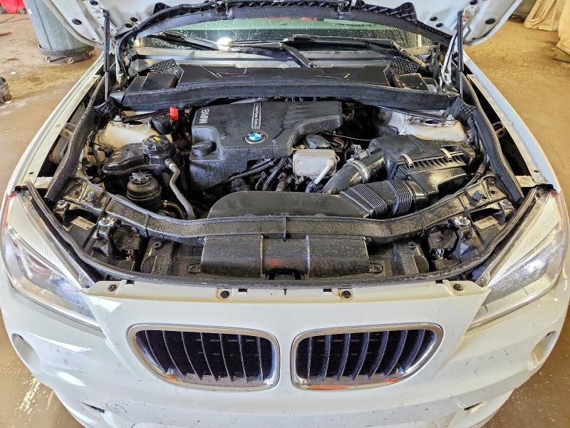 Photo 12 from auction – 2015 BMW X1 with VIN WBAVL1C5XFVY35493