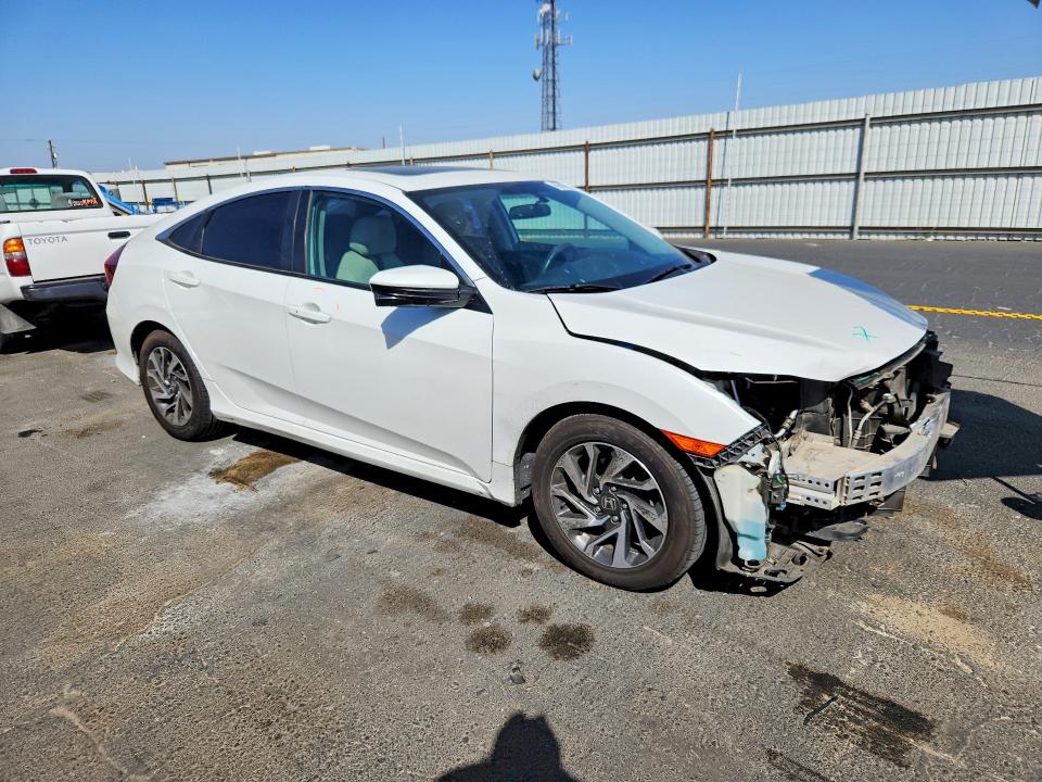Снимка 4 от търг – 2016 HONDA CIVIC с VIN 2HGFC2F74GH533171