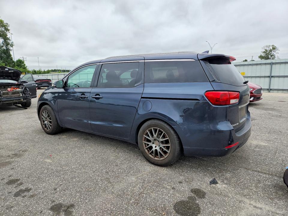 Photo 2 from auction – 2015 KIA SEDONA with VIN KNDMC5C10F6060053