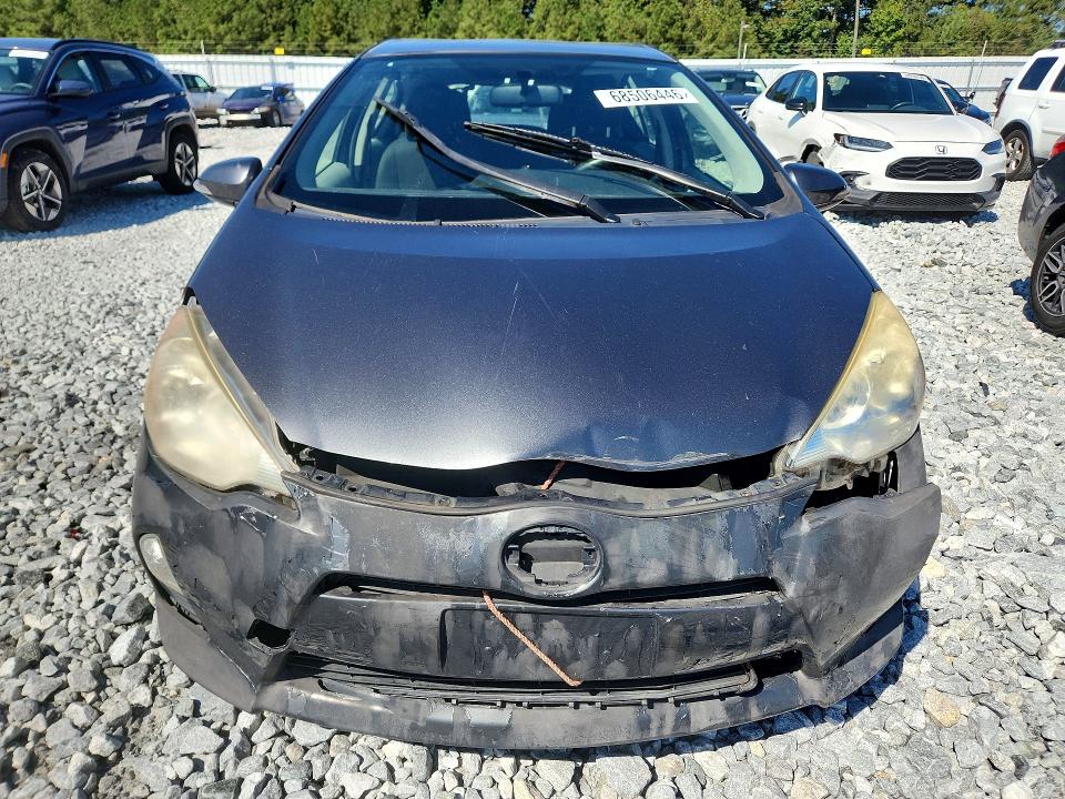 Photo 5 from auction – 2014 TOYOTA PRIUS C with VIN JTDKDTB38E1574725