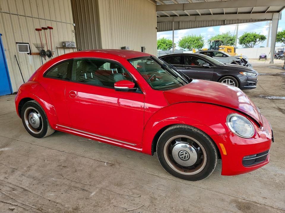 Photo 4 from auction – 2014 VOLKSWAGEN BEETLE with VIN 3VWJX7ATXEM606912