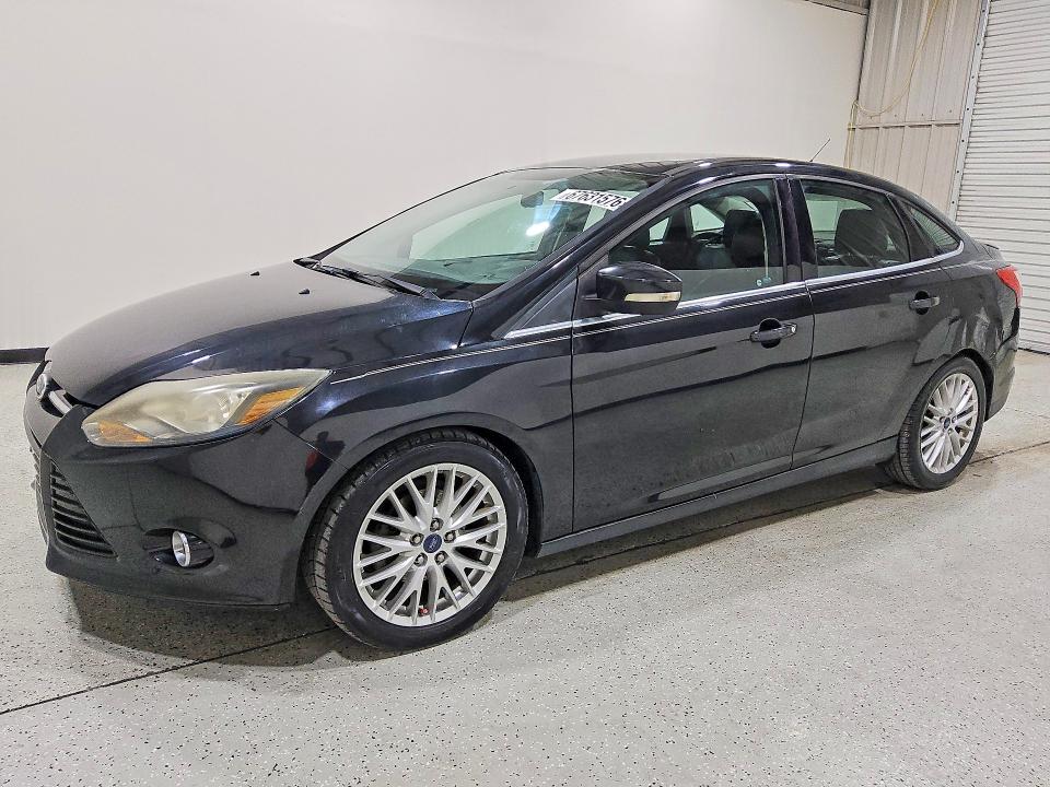 FORD FOCUS 2014 with VIN 1FADP3J29EL104156 - Photo from auction