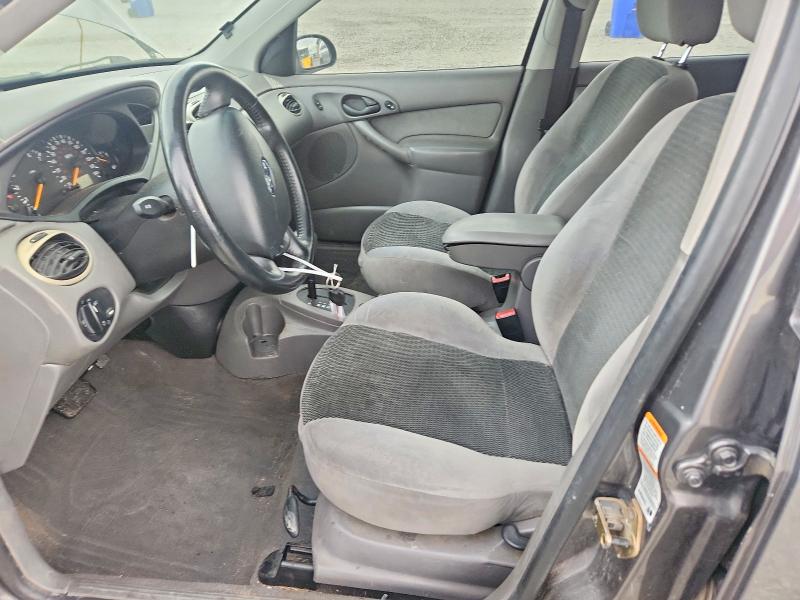 Фото 7 с аукциона – 2002 FORD FOCUS с VIN 3FAHP37382R219202